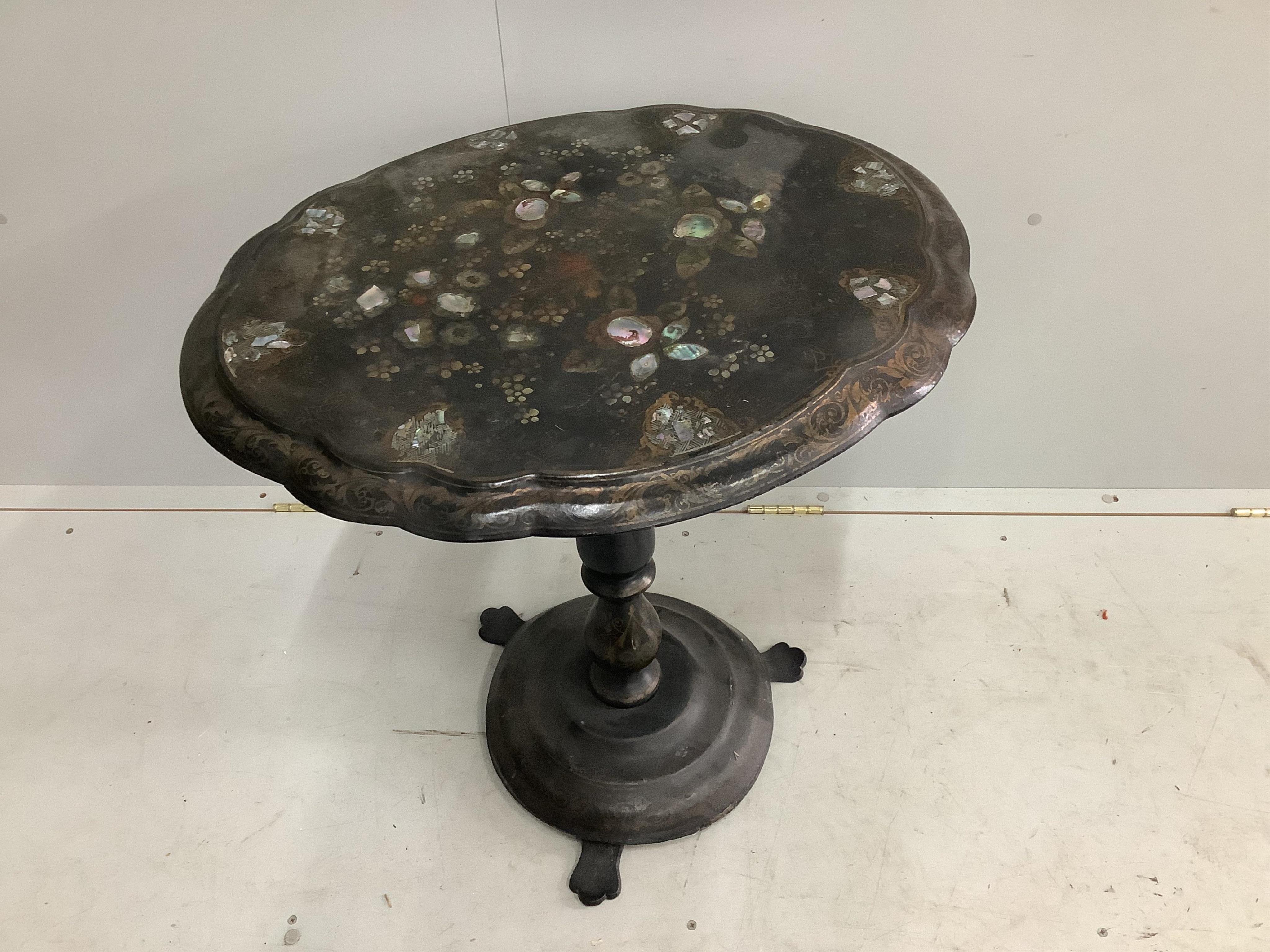 A Victorian mother of pearl inlaid painted papier mache tilt top table, width 64cm, depth 53cm, height 69cm. Condition - poor to fair